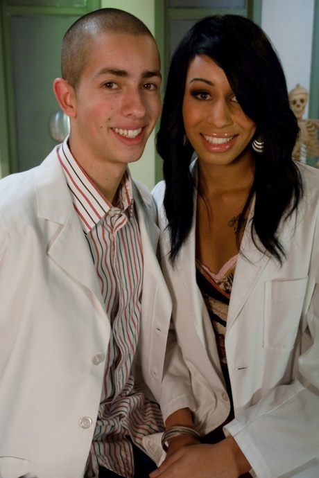 Small tit Ebony shemale Honey FoXXX getting nasty with a doctor's cock