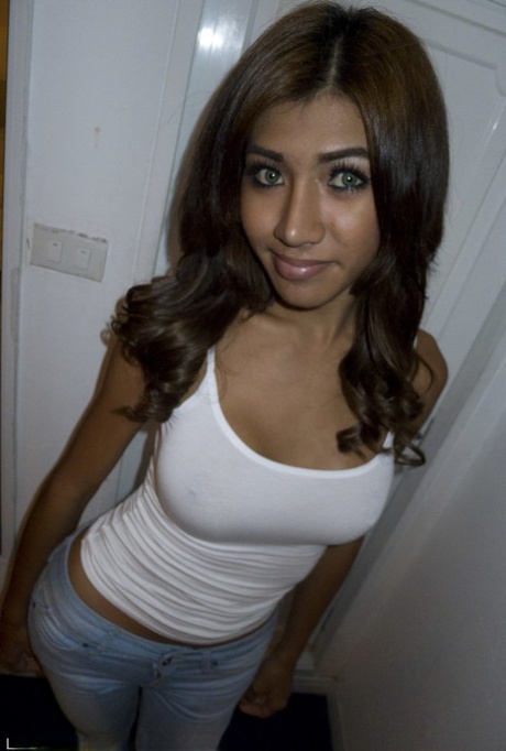 Asian shemale Narnia coaxes sperm from her dick after sex with a man