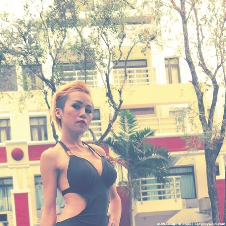 Short haired amateur Dow slips out of her swimsuit for hot stroking in heels