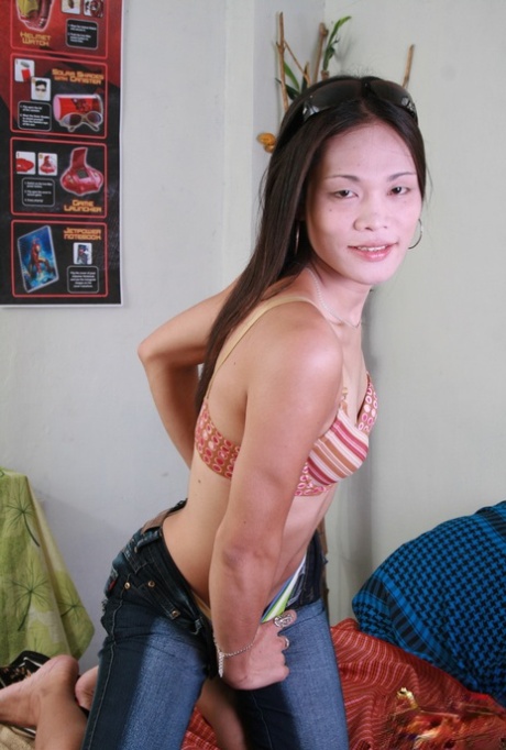 Tiny Asian shemale Cherry inserts a cock-shaped veggie in her ass & jerks off