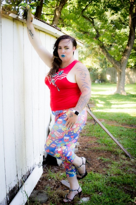 Shemale fatty Michelle Austin stripping and touching herself in the backyard