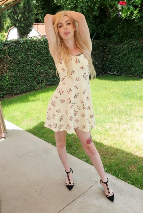 Cute skinny shemale Annabelle Lane lifts up her dress and shows her dick