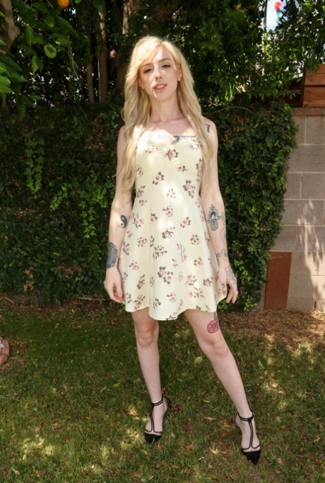 Cute skinny shemale Annabelle Lane lifts up her dress and shows her dick