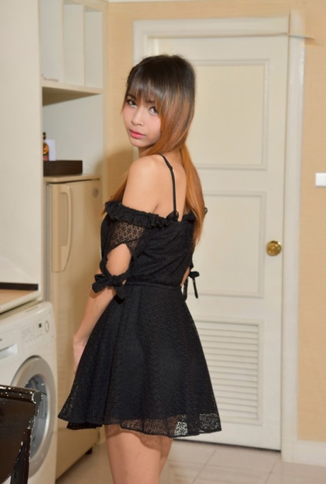 Pretty Asian trans babe Bly shows her small dick & big balls while fully naked
