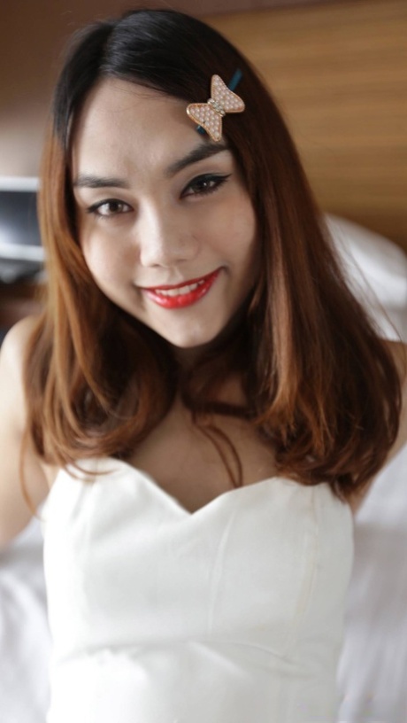 Hot Asian shemale with red lipstick gives a sloppy BJ & enjoys an anal fuck