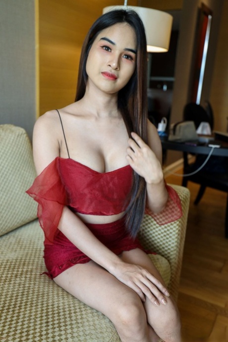 Sweet skinny ladyboy Biw flaunts her fake tits and gets rammed in POV action