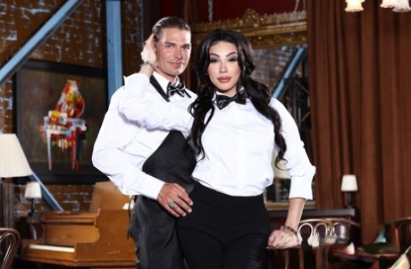 Busty transsexual waitress Ariel Demure bangs her colleague at work